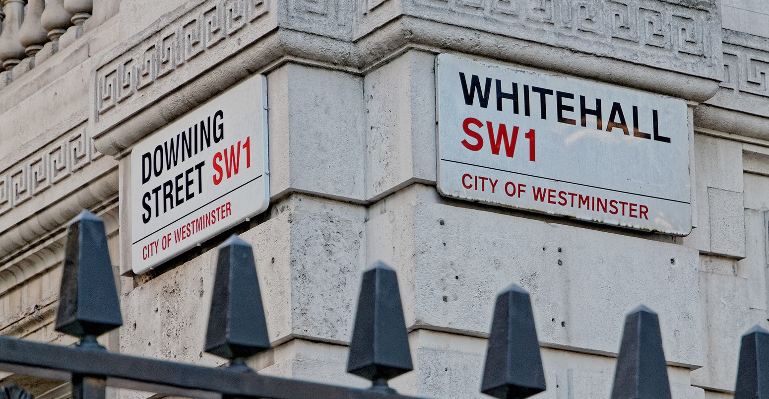 Downing Street and Whitehall street signs in Westminster, London