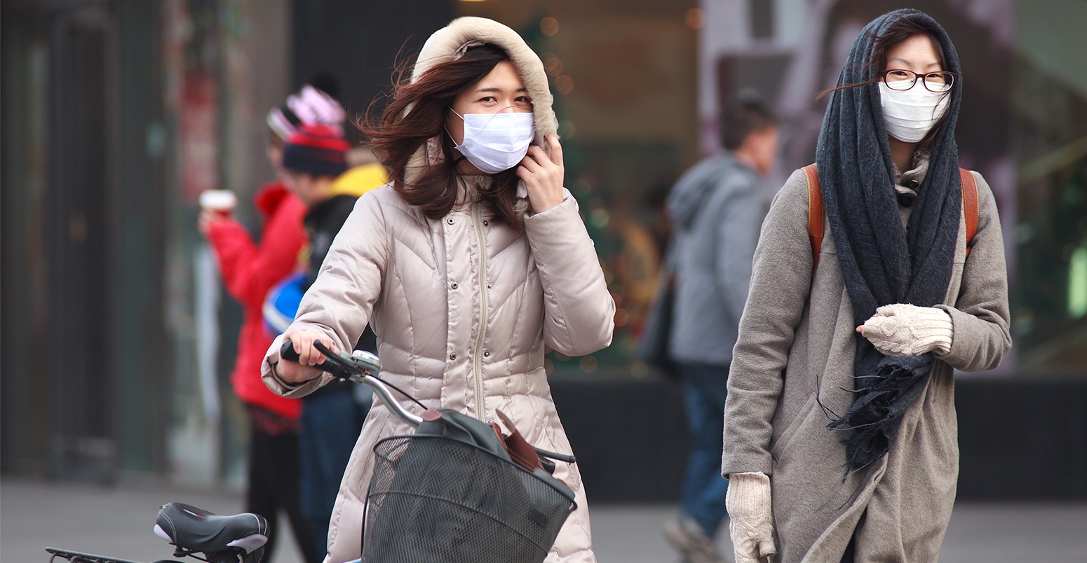 People with face masks are seen on Dec 8,2013 in Beijing, China. 104 cities in China suffered from severe air pollution on Dec 7, Beijing was among that hit the hardest