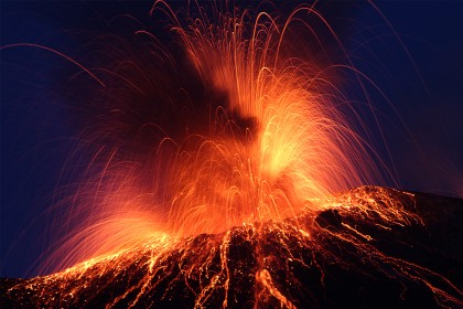 Stromboli volcano erupting at night