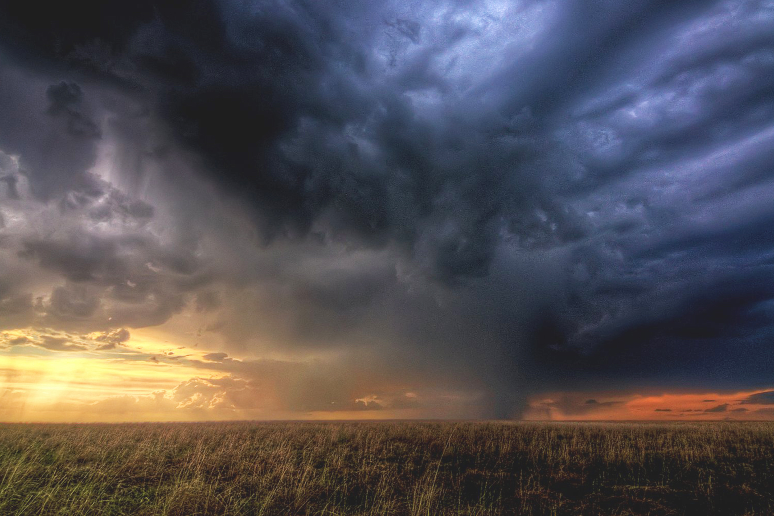 Stock Storm Clouds Gathering Over Plain Carbon Brief