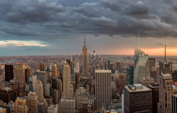 D522WM Storm clouds over city skyline