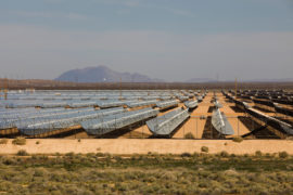 An array of solar troughs in the North American southwest desert - California, USA