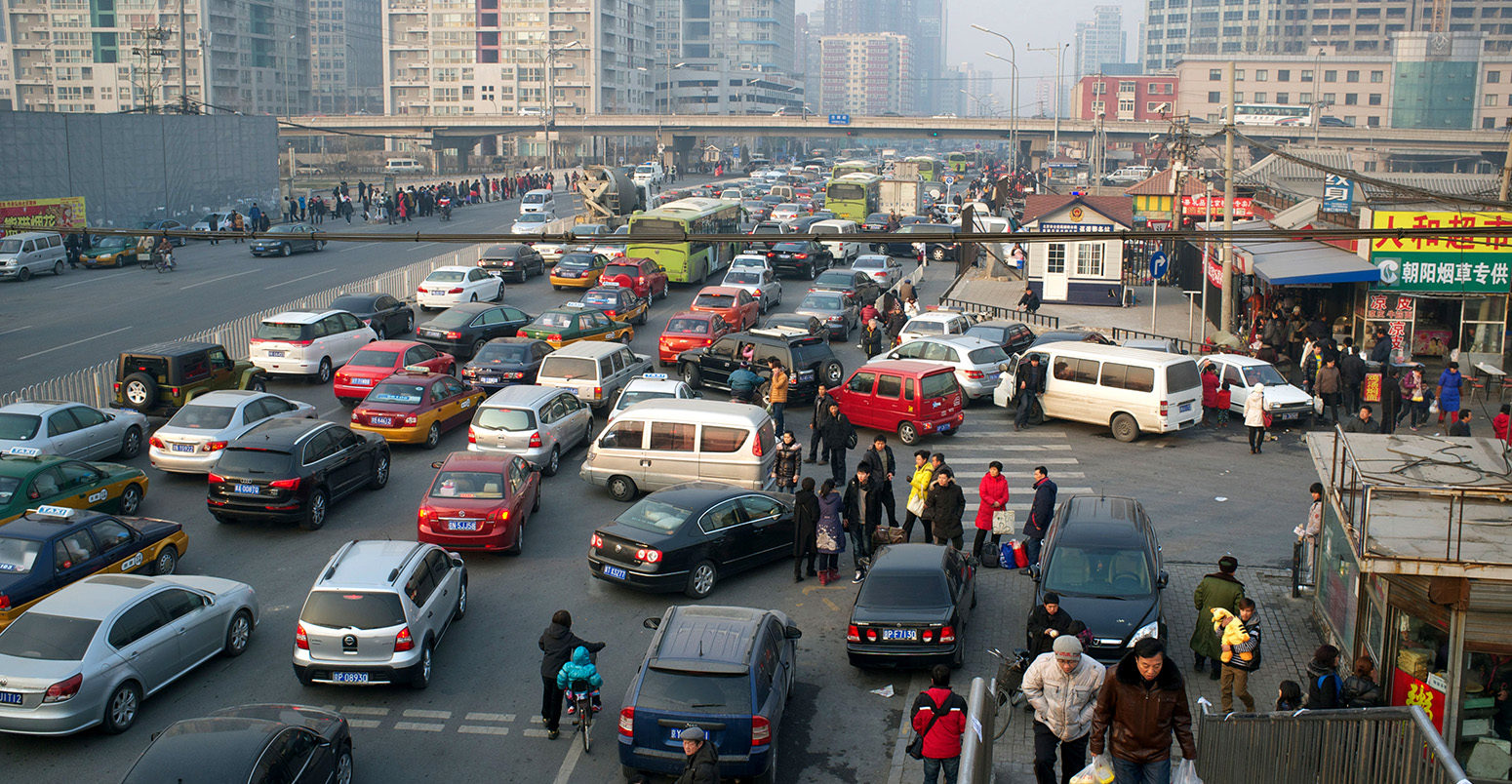 Traffic in Beijing, China. Credit: Lou-Foto / Alamy Stock Photo. CFKCFE