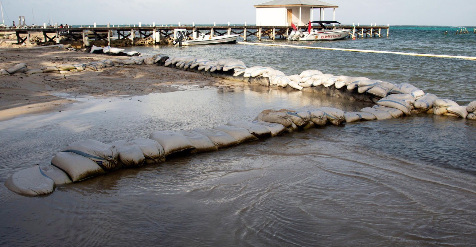 Sand bags protecting the beach from sea level rise, Belize