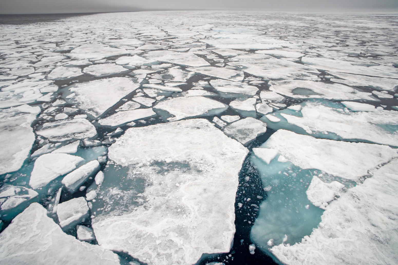 https://www.carbonbrief.org/wp-content/uploads/2021/09/Arctic-sea-ice-floe-in-Svalbard_RMKYMA.jpg
