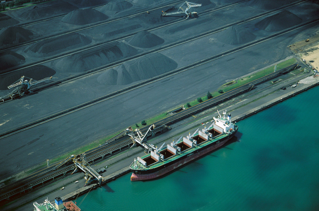 Loading coal into ship, Richards Bay, South Africa. Credit: Minden Pictures / Alamy Stock Photo.