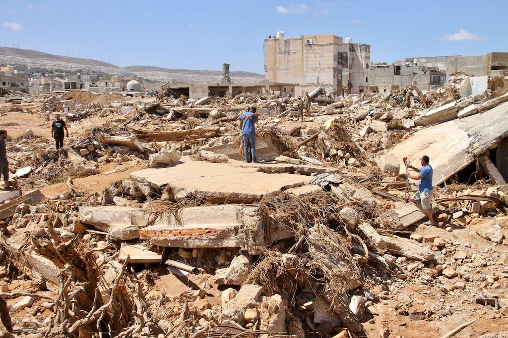 People look for survivors after a flash flood in Derna, Libya on 13 September 2023.