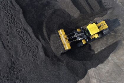 Large machines stack coal in Jiangsu Province, China.