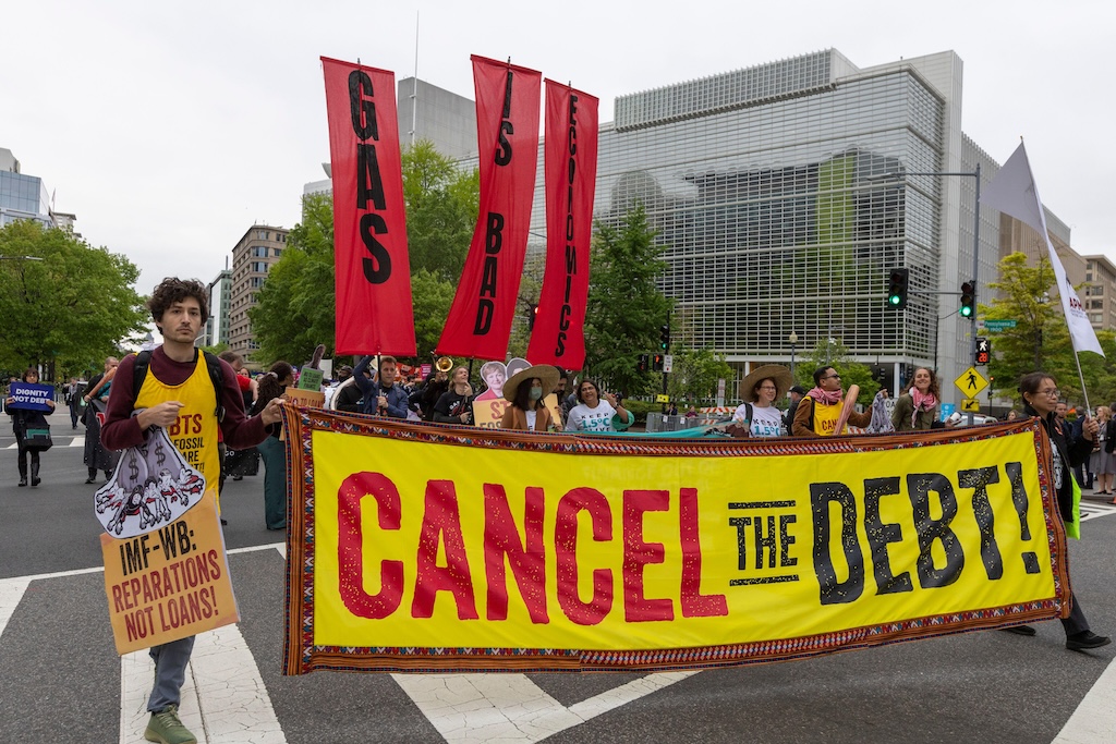 Hundreds rally and march on the final day of the IMF/World Bank Spring Meetings.