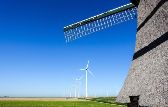 Old windmills and newer wind turbines, Netherlands.