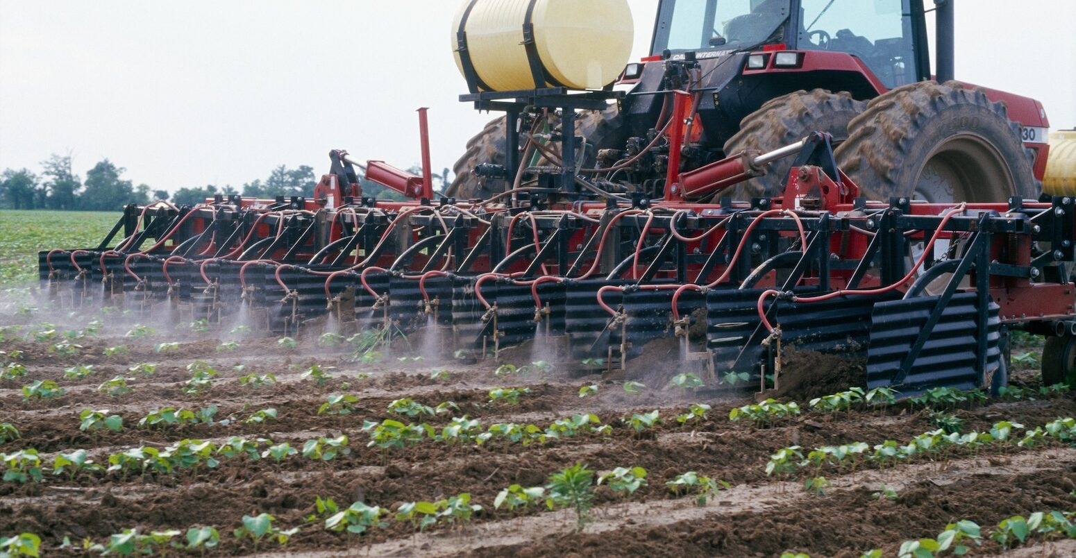 Herbicide being applied to a field of genetically modified cotton in Arkansas, US.