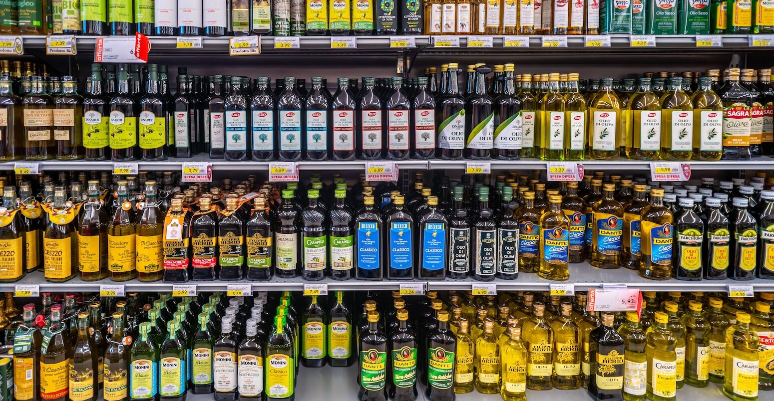 Olive oil shelves at a supermarket.