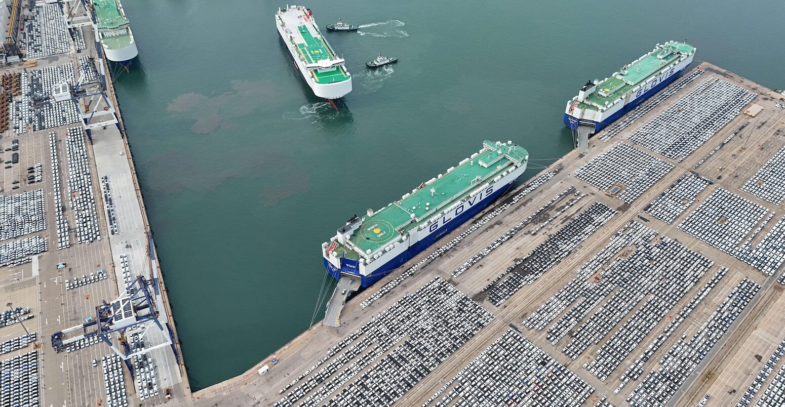 Car carriers load cars for export at Yantai Port, Shandong province, China.