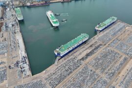 Car carriers load cars for export at Yantai Port, Shandong province, China.