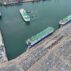 Car carriers load cars for export at Yantai Port, Shandong province, China.