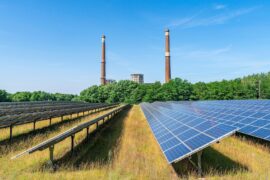 A solar park in front of a decommissioned lignite-fired power plant in Germany.