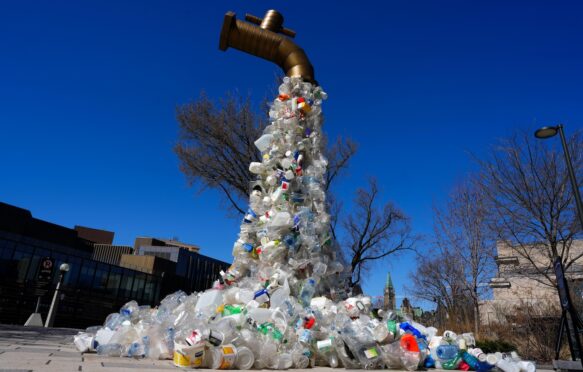 A sculpture titled "Giant Plastic Tap" by Canadian artist Benjamin Von Wong.