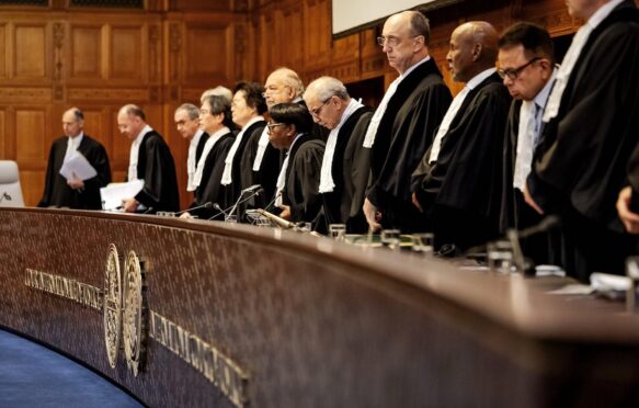 Judges at the International Court of Justice considering the obligations countries have in the fight against climate change. Credit: ANP / Alamy Stock Photo. Image ID: 2YRK7TR