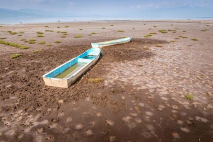 Abandoned boats on a dry lake as a result of drought in Michoacan, Mexico.