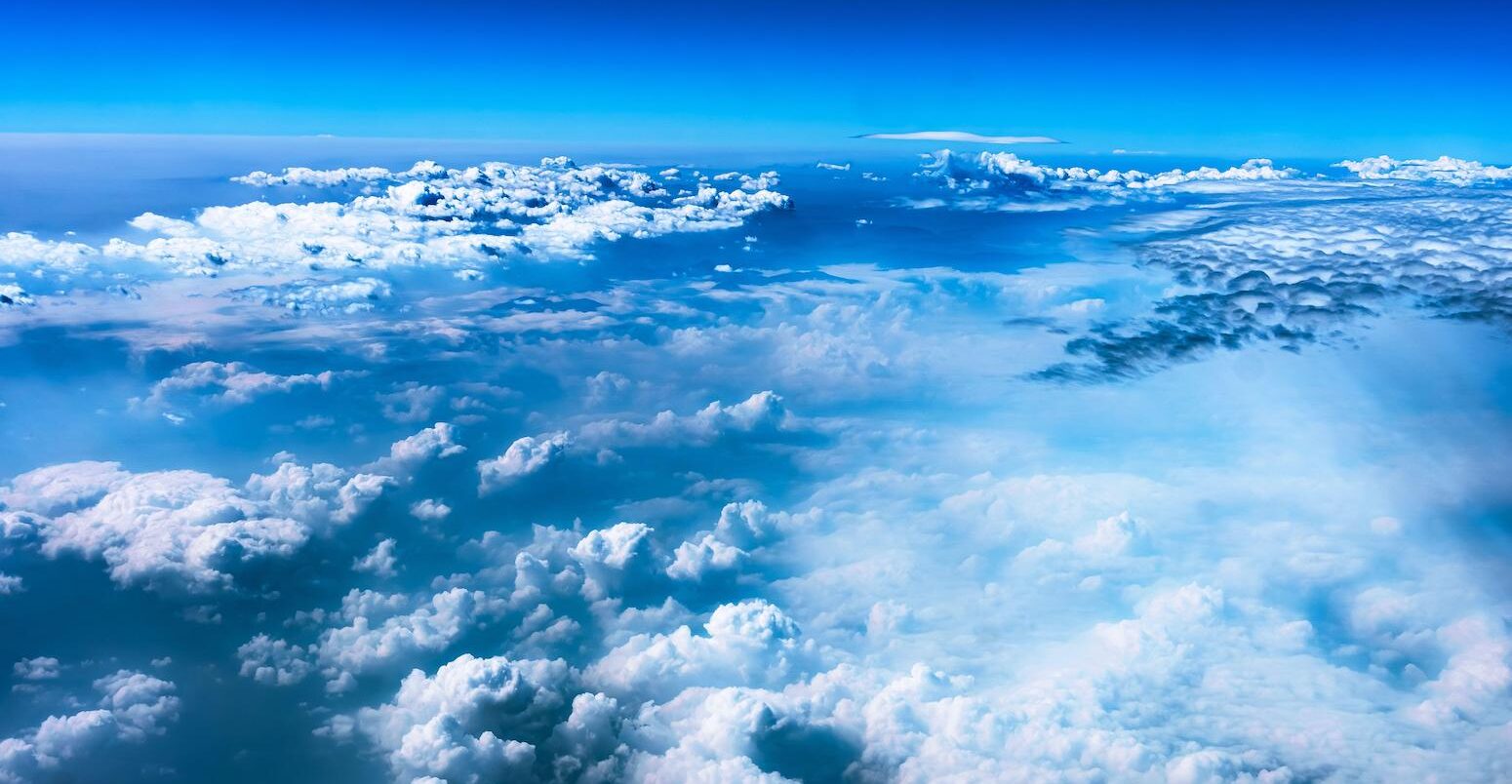 View of clouds from an aeroplane window. Credit: Feruza Tashmetova / Alamy Stock Photo. Image ID: 2YHJPPF.