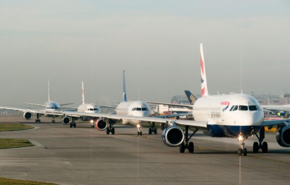 Planes queuing for takeoff at Heathrow airport in Britain.