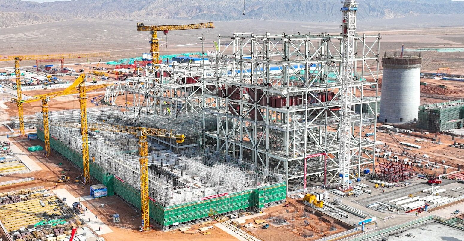 Steel structure cooling tower construction site of the coal-fired unit expansion project, Gansu Power Plant Zhangye, China. Credit: Sipa US / Alamy Stock Photo. Image ID: 2WP7PMX.