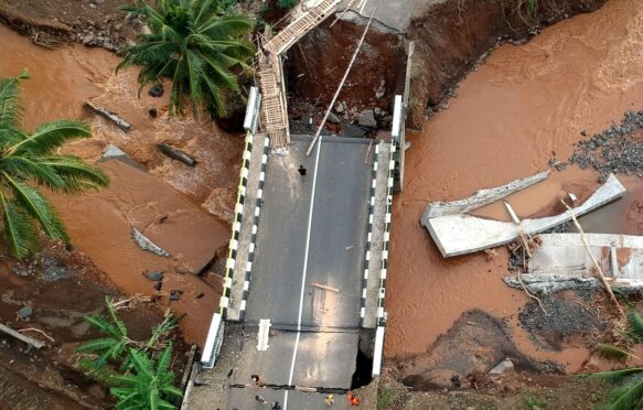 An aerial view of a bridge damaged by floods in West Java province, Indonesia in December 2024.