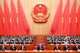 Chinese President Xi Jinping and other leaders including seated at the at the Great Hall of the People in Beijing.